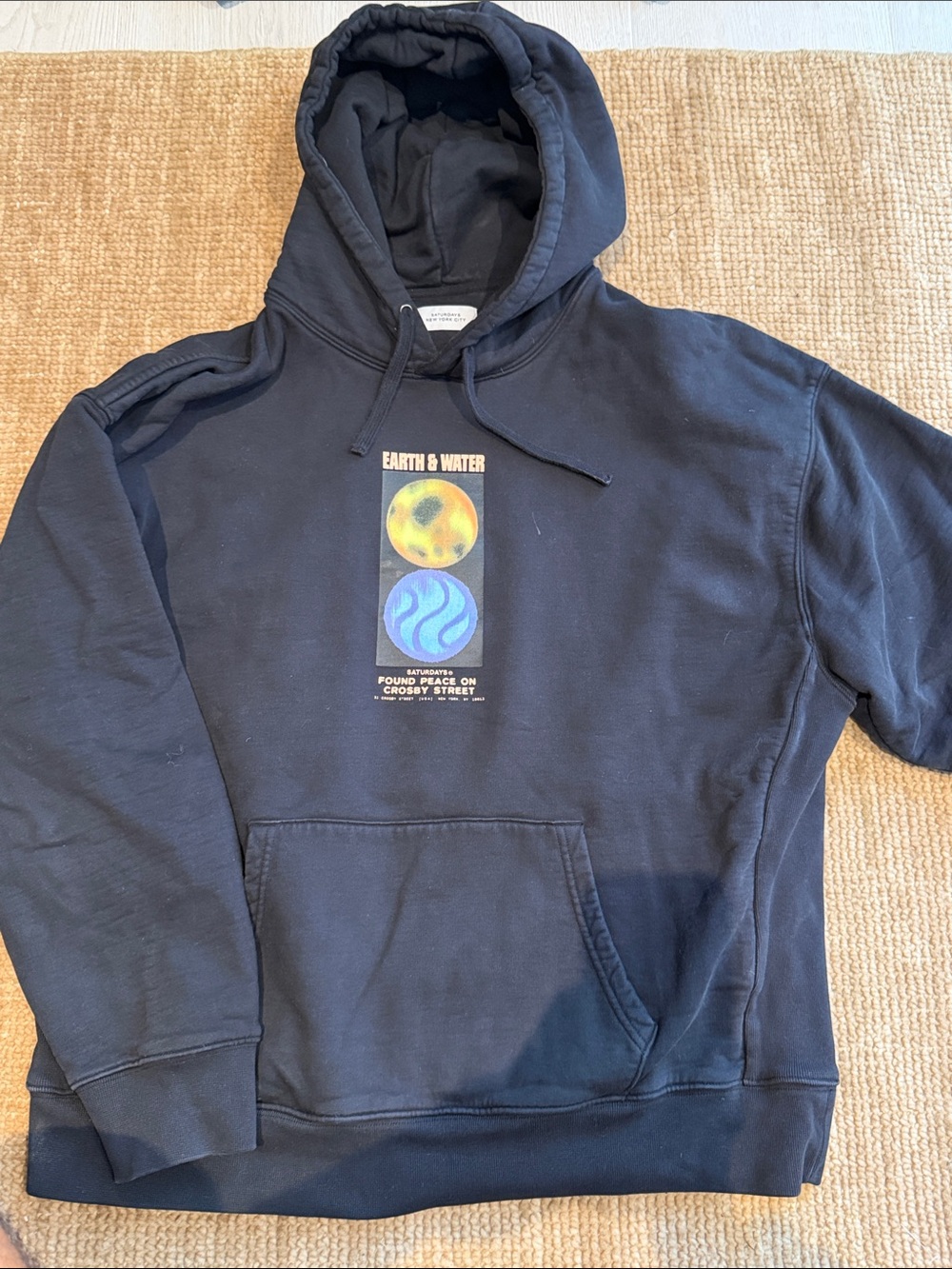 Saturdays New York City Black Hoodie with Earth & Water Graphic
